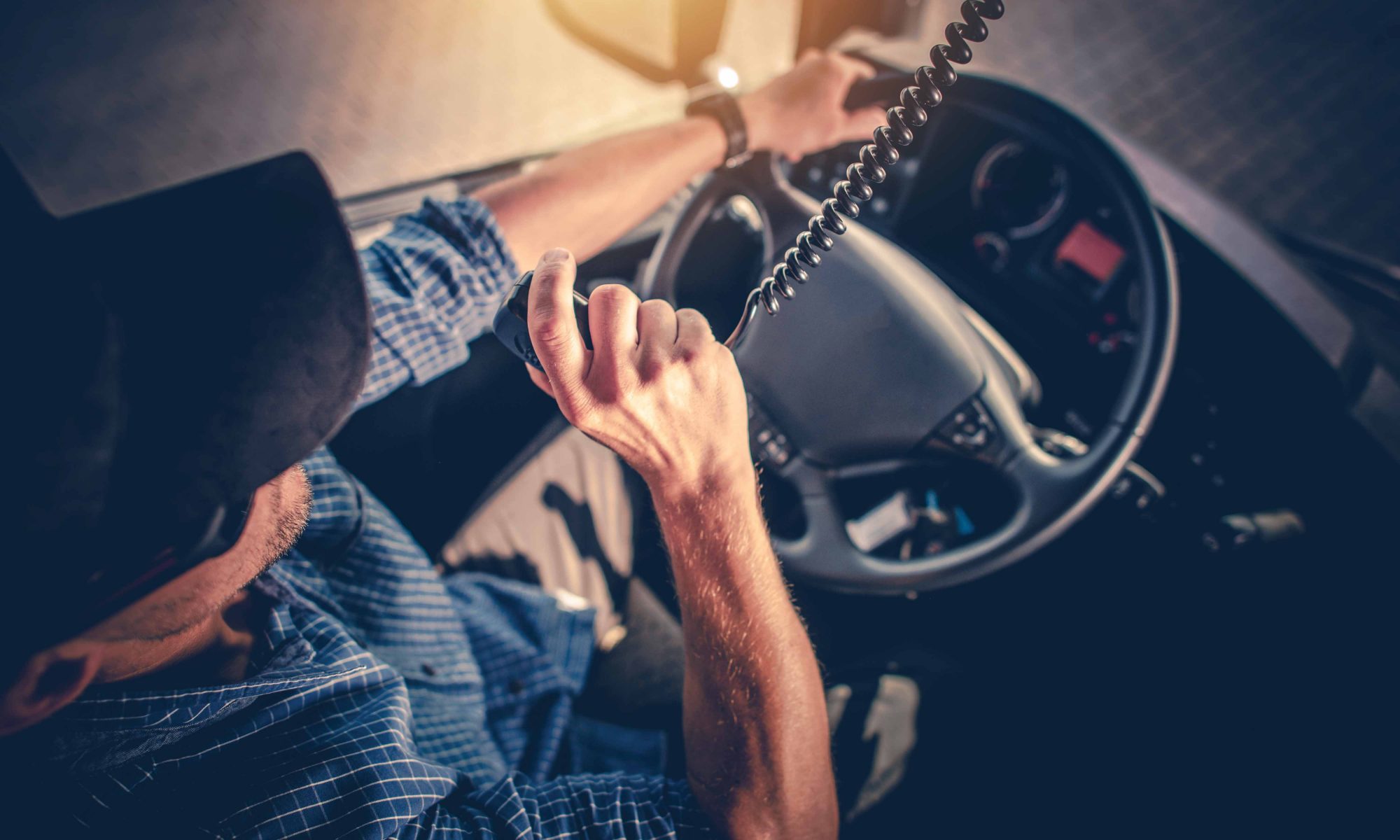 Truck driver with M50 fist microphone